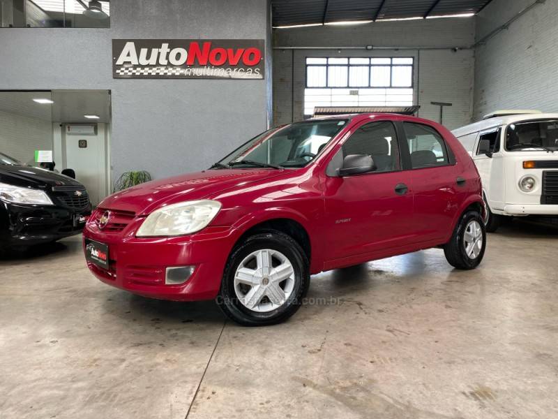 CHEVROLET - CELTA - 2009/2010 - Vermelha - R$ 24.990,00